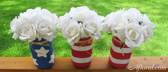 Patriotic Mason jars fillied with flowers