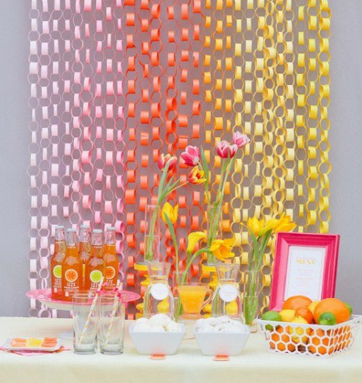 Paper chains decor in front of table of food