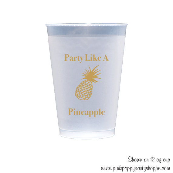 Cup labeled Party Like a Pineapple with decal of a pineapple, writing in gold