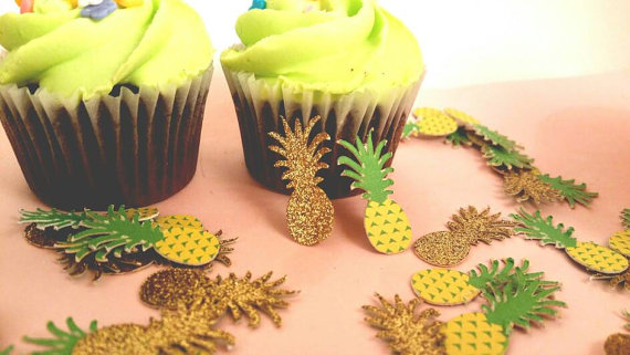 Pineapple Confetti on a table with two cupcakes