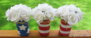 Patriotic Mason jars fillied with flowers
